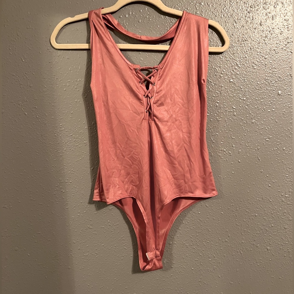 Pink silk body suit